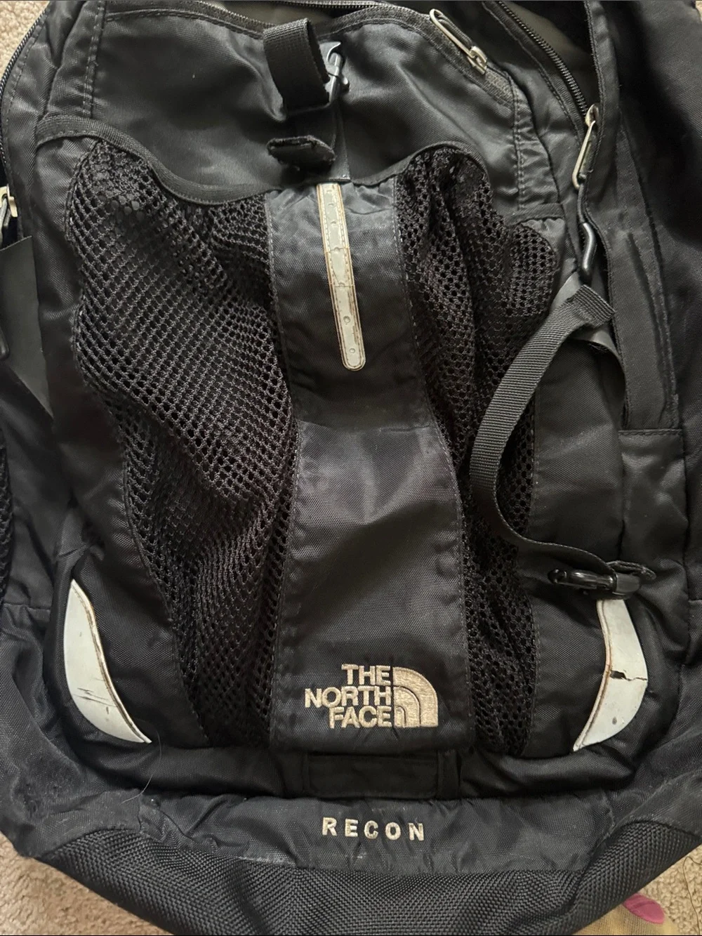 The North Face Black Backpack with Mesh Pockets